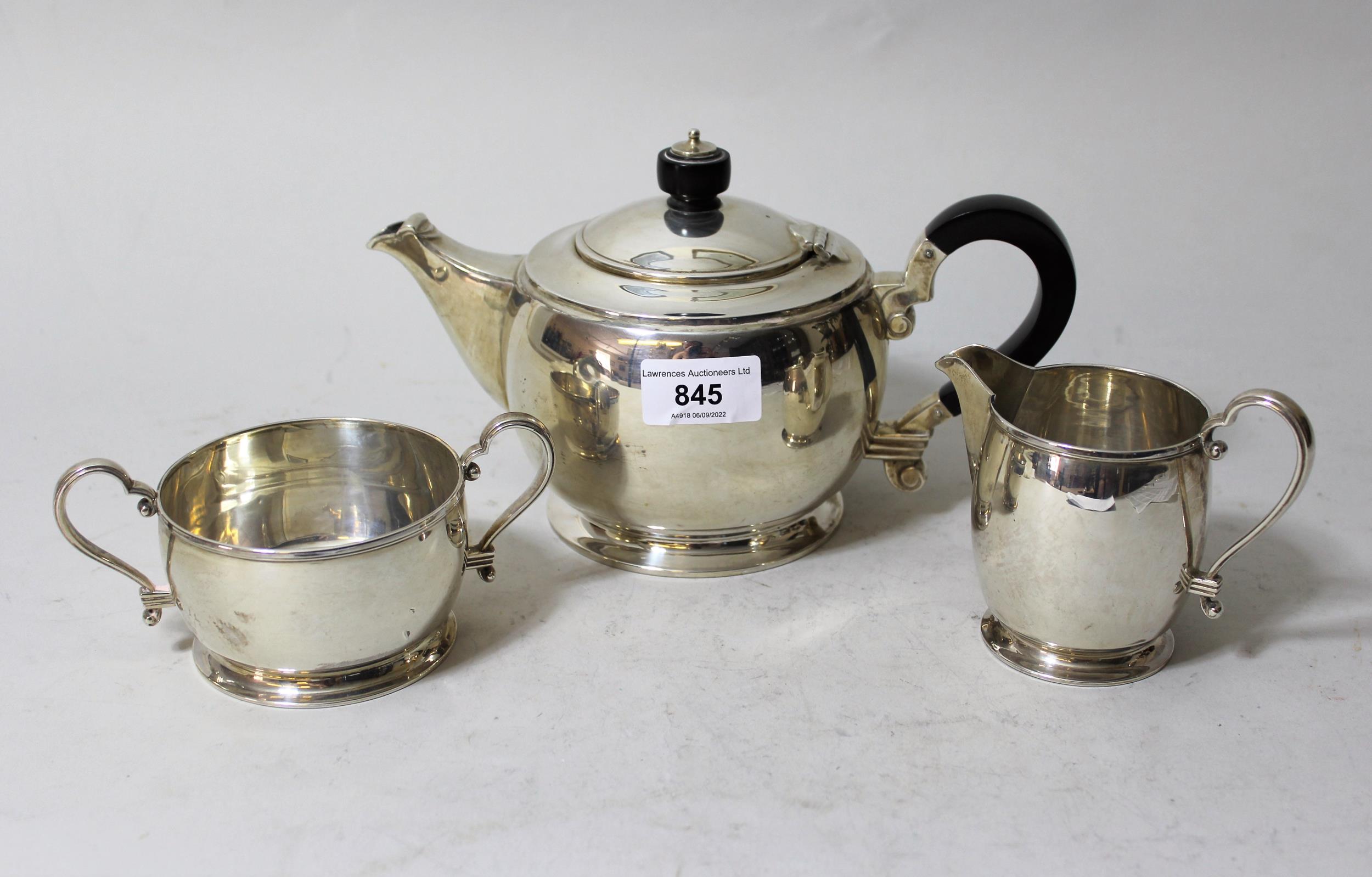 20th Century Mappin & Webb circular silver three piece tea service, Birmingham 1939, 26oz No