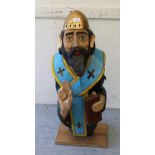 Painted carved wooden figure of a clergyman, 40ins high