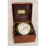 Quartz table clock by Dunhill in the form of a marine chronometer, housed in a mahogany case with
