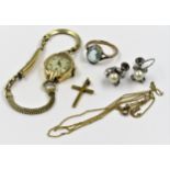 9ct Gold pendant cross on chain (chain at fault), ladies 14ct gold cased wristwatch on a plated
