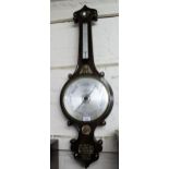 19th Century rosewood mother of pearl inlaid wheel barometer, the silvered dial inscribed Young, 92,
