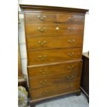 Late George III mahogany tallboy, the moulded cornice above two short drawers and six long graduated