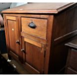 19th Century Colonial teak clerks desk, the hinged writing slope above two panelled doors and a