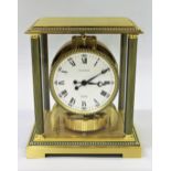 Jaeger-LeCoultre Atmos clock, the patinated and gilt brass four glass case with fluted column