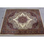 Machine woven Persian design carpet on beige ground, 144ins x 108ins
