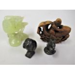 Small Chinese wood carving of a figure riding a fish, 2.5ins wide, small jadeite figure of a bird