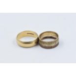 Plain 22ct gold wedding band together with another similar, smaller, 11.5g gross Both 22ct gold.