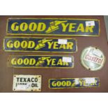 Four small enamel signs for Goodyear tyres, the largest 3ins x 16ins together with a small