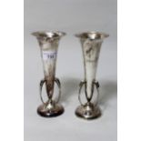 Pair of hand beaten silver flared rim vases of Art Nouveau design, London 1920, makers Goldsmiths