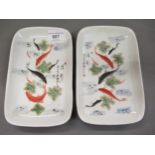 Pair of 20th Century Chinese porcelain rectangular dishes decorated with fishes, painted signature