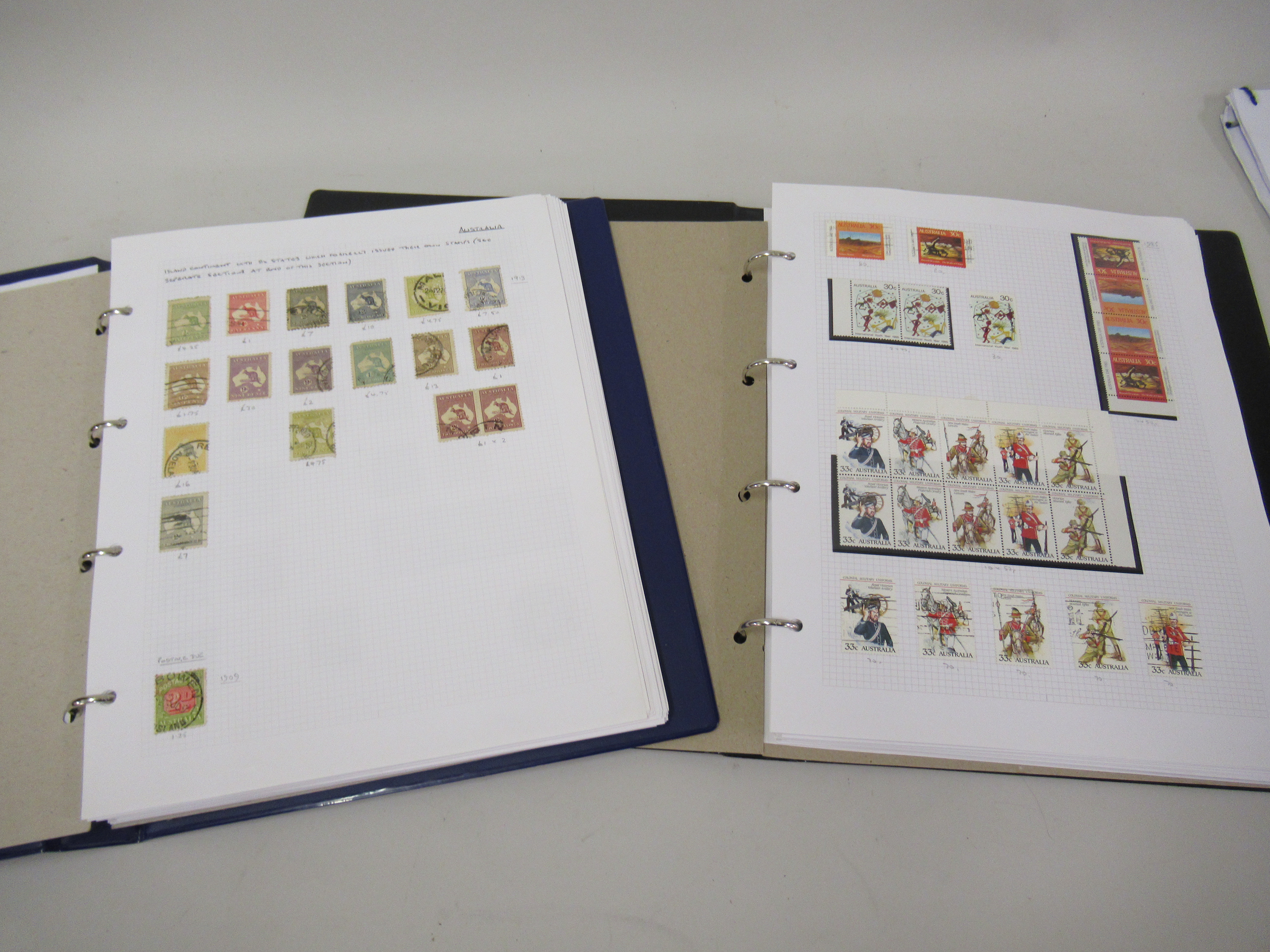 Two loose leaf albums containing a collection of Australia and Australian States stamps, Victoria to