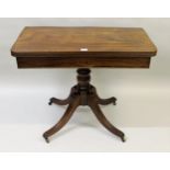 Regency mahogany fold-over card table on a turned column support with quadruped, 36ins wide