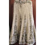 Indian ladies skirt with shawl and another gold and silver threadwork decorated skirt