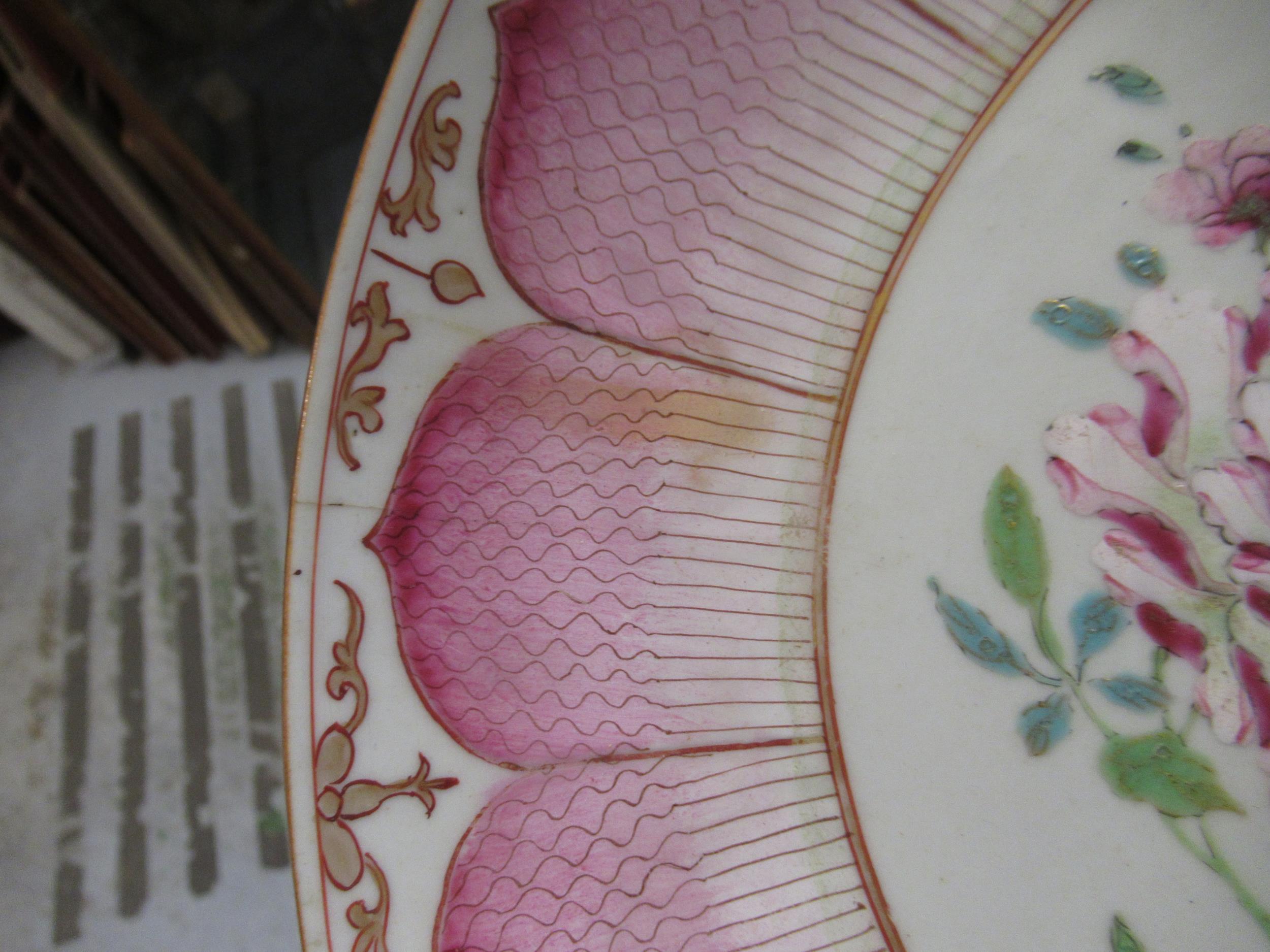 18th Century Chinese famille rose saucer dish painted with a central flowering shrub within a pink - Image 23 of 28