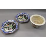 Pair of 20th Century Chinese octagonal dishes, with bird and floral decoration on black ground,