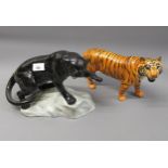 Large Beswick figure of a black panther, 12ins wide approximately together with a similar figure