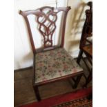 George III mahogany side chair with a pierced splat back and drop-in needlepoint seat, together with