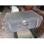 Vintage leather suitcase with brass locks