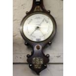 19th Century rosewood mother of pearl inlaid wheel barometer, the silvered dial inscribed Young, 92,