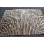 Modern Tibetan rug with a striped design in shades of ivory, beige, green, red and yellow, 7ft