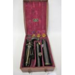 Early 20th Century leather cased portable telescope with tripod, ' Davon ' patent, the hinged case