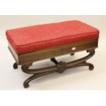 Late 19th Century walnut duet box seat piano stool, the hinged cover on carved shaped crossover