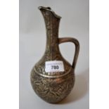 Unusual Russian silver jug vase, with all-over embossed floral and stylised animal decoration,