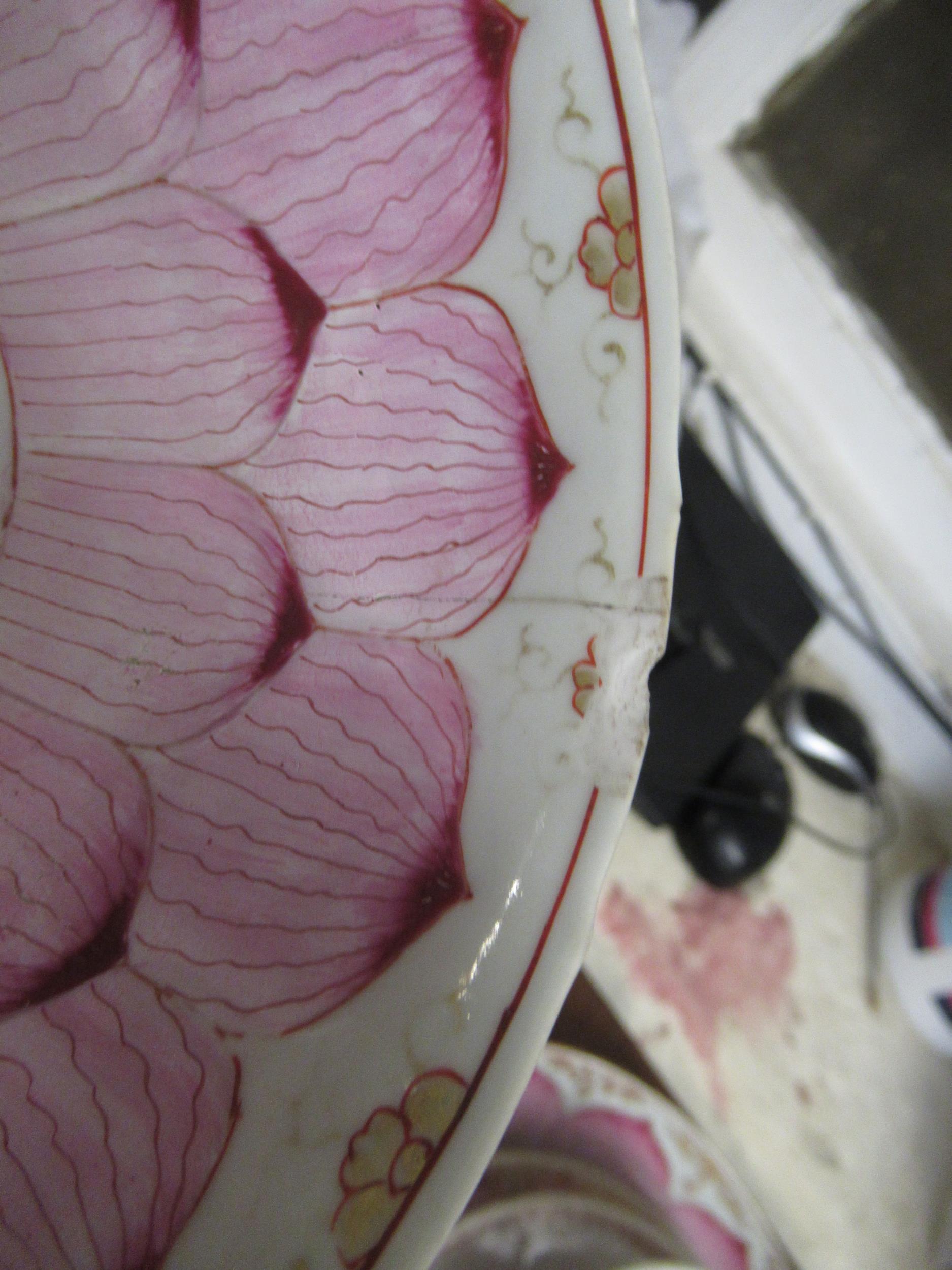 18th Century Chinese famille rose saucer dish painted with a central flowering shrub within a pink - Image 9 of 28