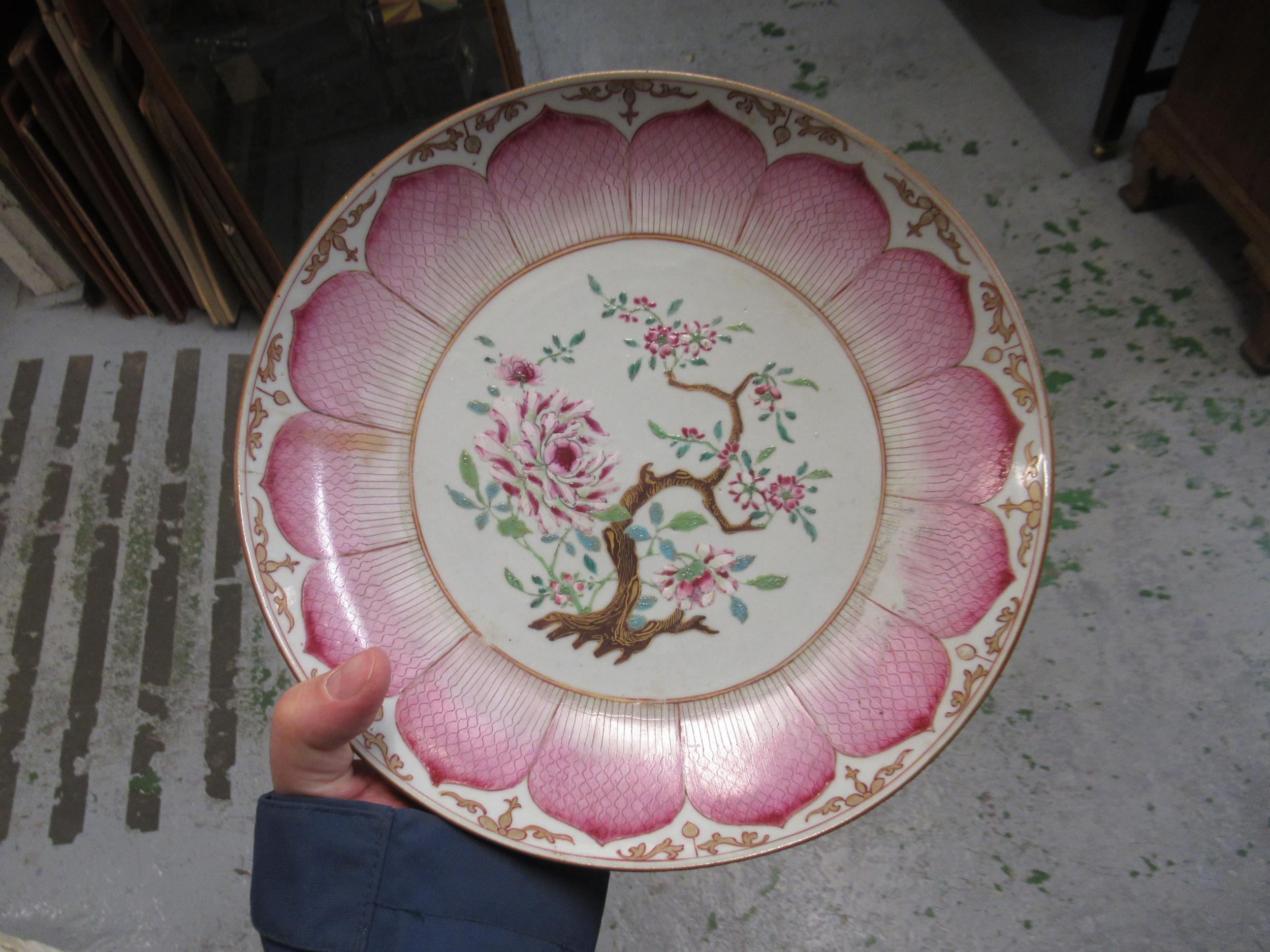 18th Century Chinese famille rose saucer dish painted with a central flowering shrub within a pink - Image 22 of 28