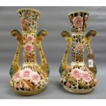 Near pair of large Zsolnay Pecs two handled reticulated baluster form vases, each with typical