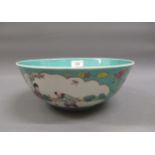 20th Century Chinese circular bowl, decorated with panels of figures in landscapes on a turquoise