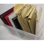 Box containing a quantity of albums of World stamps and envelopes, and loose leaves of stamps