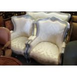 Reproduction French style three piece silvered and carved wooden salon suite upholstered in floral