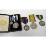 Cased Victoria 1897 commemorative medal with miniature, together with three other various medals