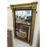 19th Century gilt framed pier mirror with reeded columns and black slip, 34ins high x 23ins wide