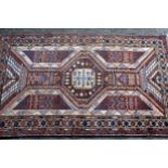 Small Belouch rug, 4ft 3ins x 2ft 10ins approximately, together with a small Chinese black and white