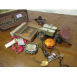 Tin containing a quantity of miscellaneous collectables including a monocular, needlepoint evening