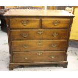 George III oak straight front chest of two short and three long drawers with brass handles,