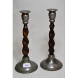 Pair of Art Deco beaten pewter and oak barley twist candlesticks No dents but wooden stick is