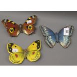 Group of three Beswick models of butterflies, ' Peacock ' No. 1489, ' Purple Emperor ' No. 1487