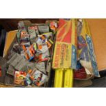 Box containing approximately thirty carded matchbox vehicles, and a Superfast race set