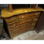 20th Century Swedish maple serpentine fronted chest of four long drawers (the top drawer fitted)