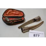 19th Century small Continental white metal opium pipe, in a fitted case, together with two