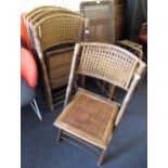 Set of five colonial bamboo and rattan folding chairs, circa 1920 Caning does appear to have a bit