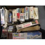 Box containing approximately sixteen model aircraft and tank kits by Revel etc.