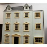 Large pale blue painted wooden dolls house in Georgian style 87cm high x 82cm wide x 32cm deep