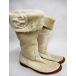 Pair of ladies Gucci fur lined suede boots, together with dust bag There is no size on them but we