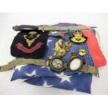 Military issue wrist compass, together with a small quantity of military buttons and two badges, and