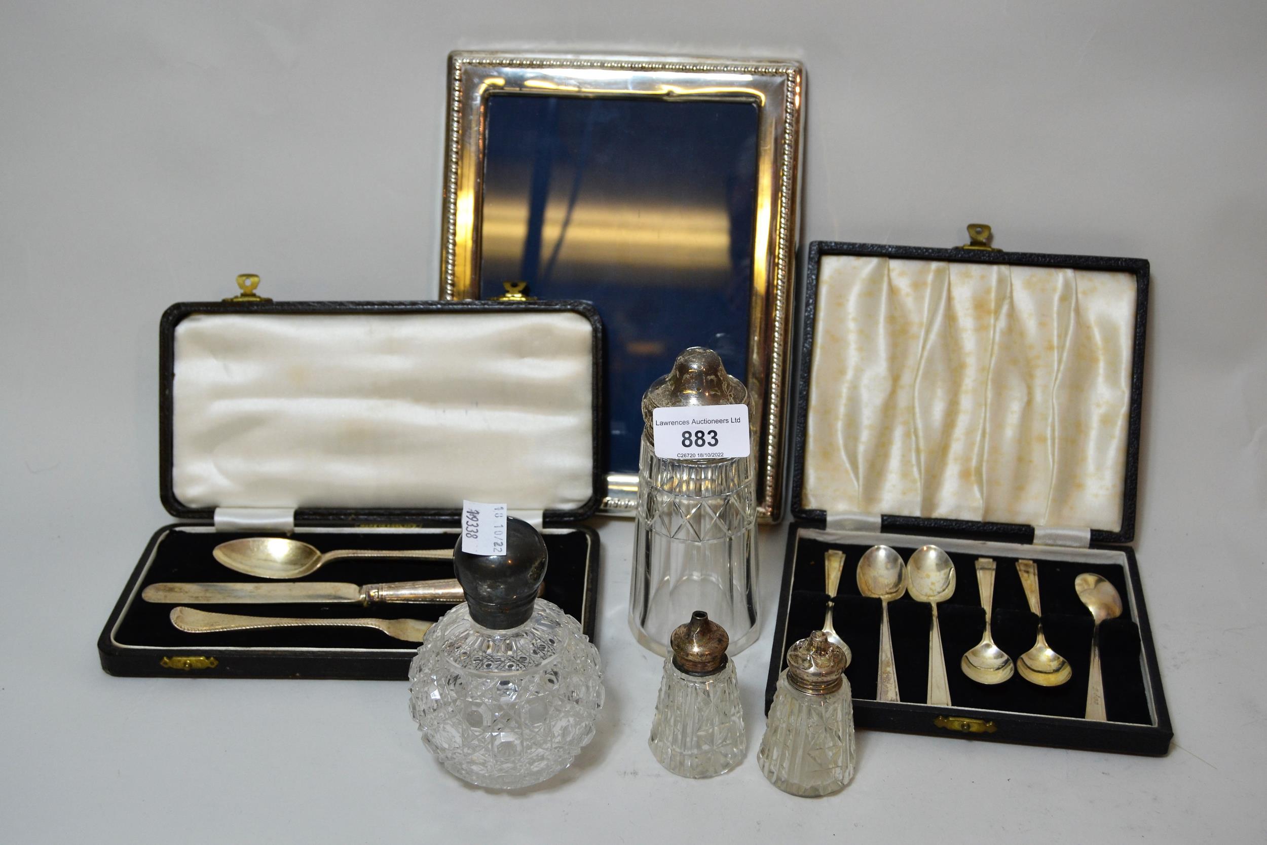 Silver mounted cut glass scent bottle, silver mounted shaker and two condiments, cased set of six