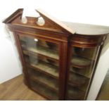 Edwardian mahogany and marquetry inlaid wall cabinet, the broken arch pediment above a glazed door